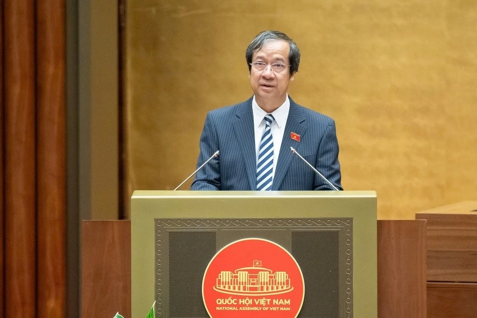 Bộ trưởng Giáo dục và Đào tạo Nguyễn Kim Sơn trình Quốc hội 3 dự án luật sửa đổi liên quan giáo dục sáng 10/12.