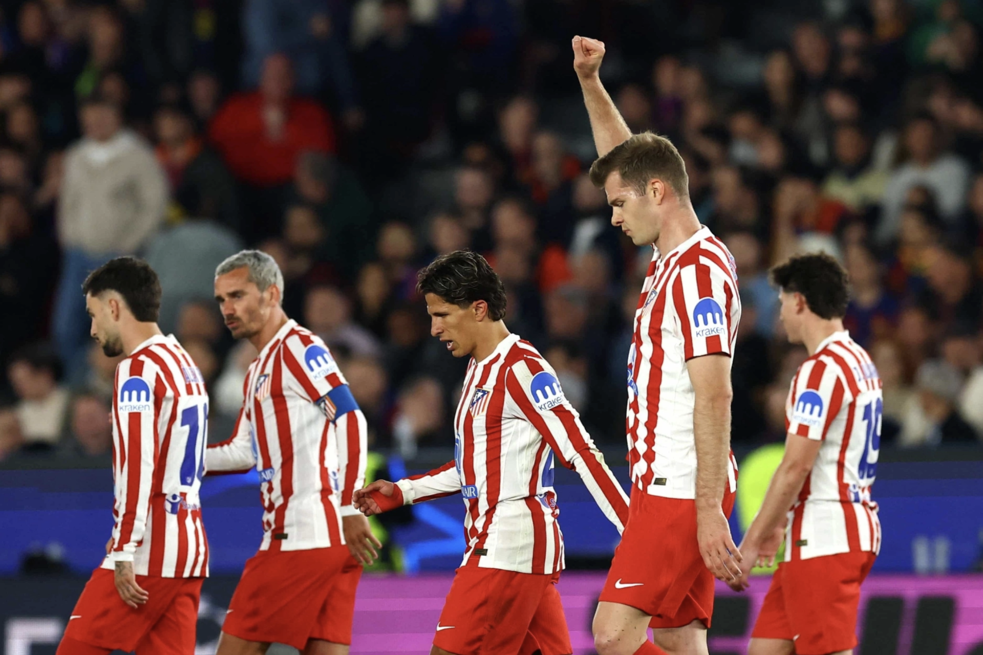 C&aacute;c cầu thủ Atletico ăn mừng chiến thắng.